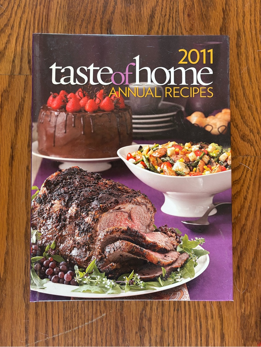 Taste of Home Cookbook with Purple Cover and Colorful Food Photography